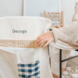 Personalised chair bag - canvas with gingham pocket for kids, featuring embroidered names.