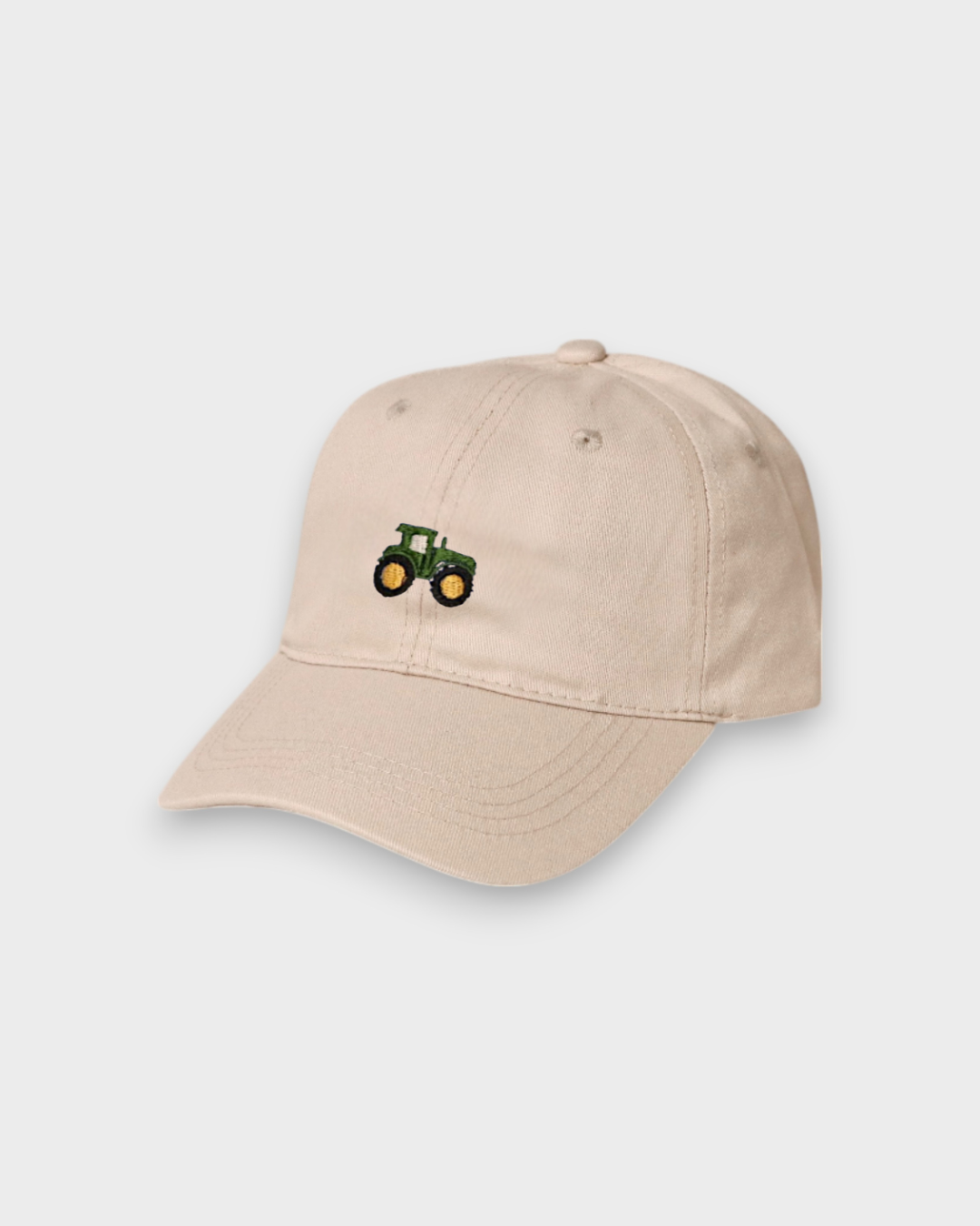 Beige Tractor Personalised Hat with hand-embroidered green tractor design on front and customizable embroidery on back, made of 100% washed cotton with classic baseball fit.