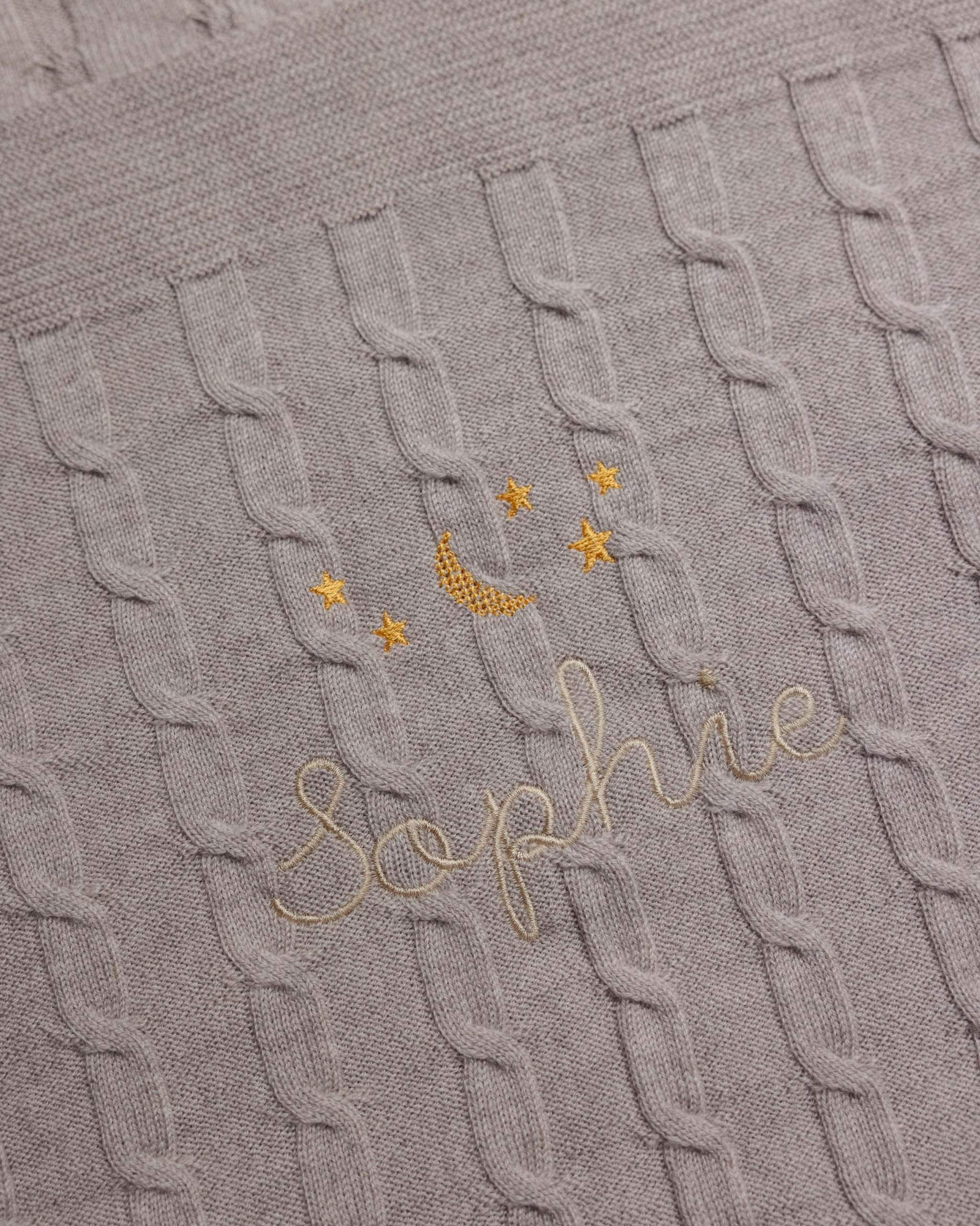 Soft merino baby blanket with moon and stars embroidery and personalized name Sophie in cross stitch design