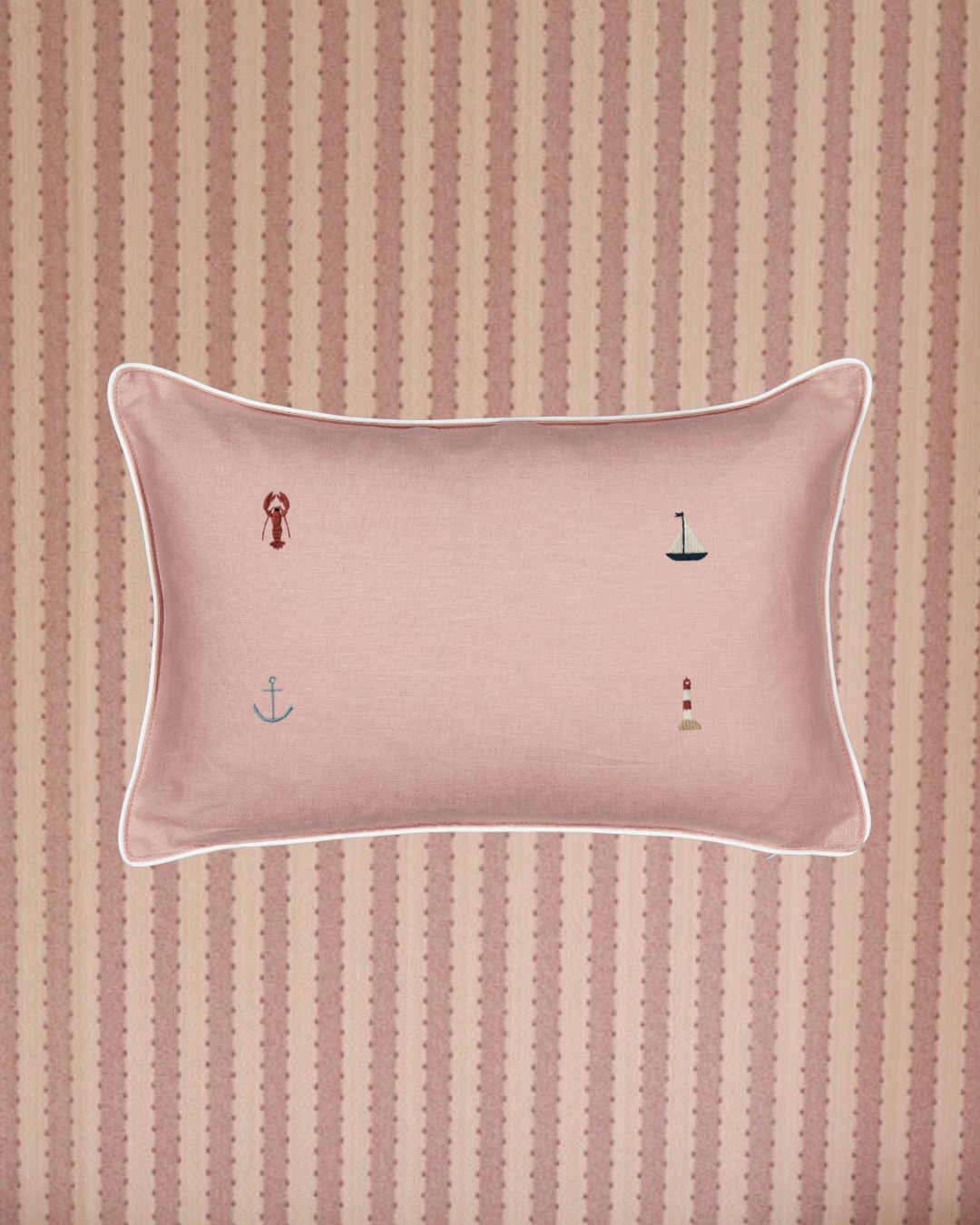 Nautical cushion with hand-embroidered sea motifs on natural linen fabric with white piping, 30x45cm, heirloom quality.