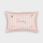 Botanical linen cushion with pink gingham pattern, hand-embroidered floral designs, and personalized name embroidery