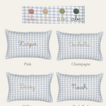 Botanical Linen Cushion with hand-embroidered names in pink, champagne, willow, and dark teal on blue check fabric, made from 100% European flax linen.