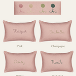 Personalized Botanical Linen Cushion in pink with embroidered names, available in four thread colors: pink, champagne, willow, and dark teal.