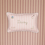 Botanical Linen Cushion with pink gingham pattern, floral embroidery, personalized name "Daisy," white piping, and soft removable cover.