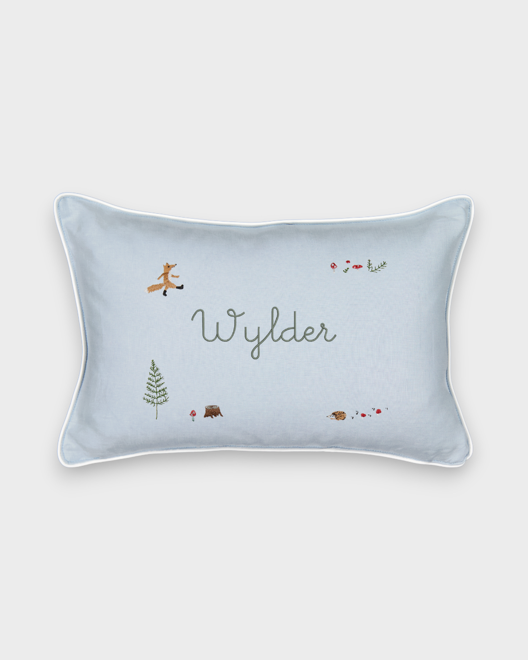 Woodland Keepsake Linen Cushion with embroidered fox, forest animals, and personalized name on light blue linen with white piping