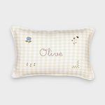 Botanical Linen Cushion with hand-embroidered floral designs and personalised name on beige check linen fabric with white piping.