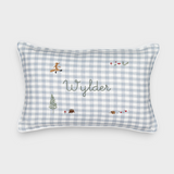 Rectangular Woodland Keepsake Linen Cushion with blue and white check pattern, embroidered with personalized name "Wylder" and small woodland animal and nature designs.