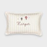 Rectangular linen cushion with embroidered vintage hot air balloons and personalized name on cream gingham fabric with white piping