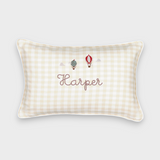 Rectangular linen cushion with embroidered vintage hot air balloons and personalized name on cream gingham fabric with white piping
