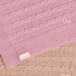 Merino baby blanket with moon and stars design, lilac and taupe colors.