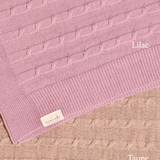 Merino baby blanket with moon and stars design, lilac and taupe colors.