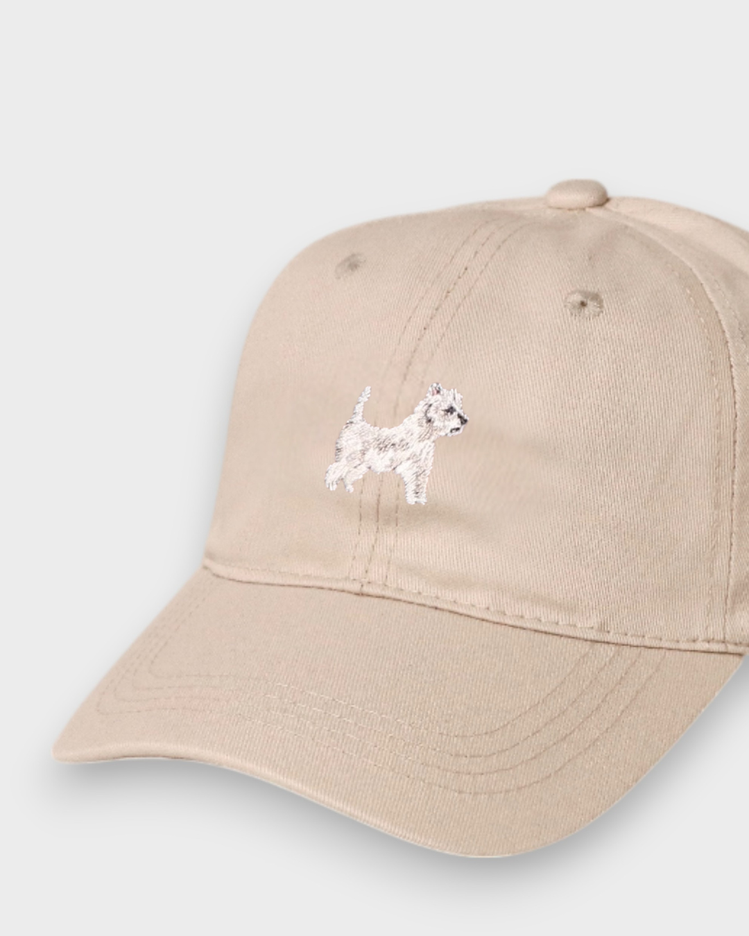 Beige personalised hat with embroidered West Highland White Terrier design on front and custom embroidery option on back