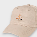 Cream baseball cap with hand-embroidered fox design and personalised back embroidery, 100% washed cotton.