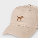 Beige Cavoodle personalised hat with hand-embroidered Cavoodle design on front made of 100% washed cotton.