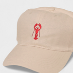 Personalised hat with hand-drawn lobster embroidery design.