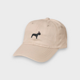 Beige baseball cap with embroidered black French Bulldog design and customizable back embroidery, made of 100% washed cotton.