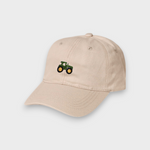 Beige Tractor Personalised Hat with hand-embroidered green tractor design on front and customizable embroidery on back, made of 100% washed cotton with classic baseball fit.