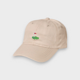Beige Hole In 1 personalised embroidered baseball hat with golf green design, made of 100% washed cotton, available in kids and adult sizes.