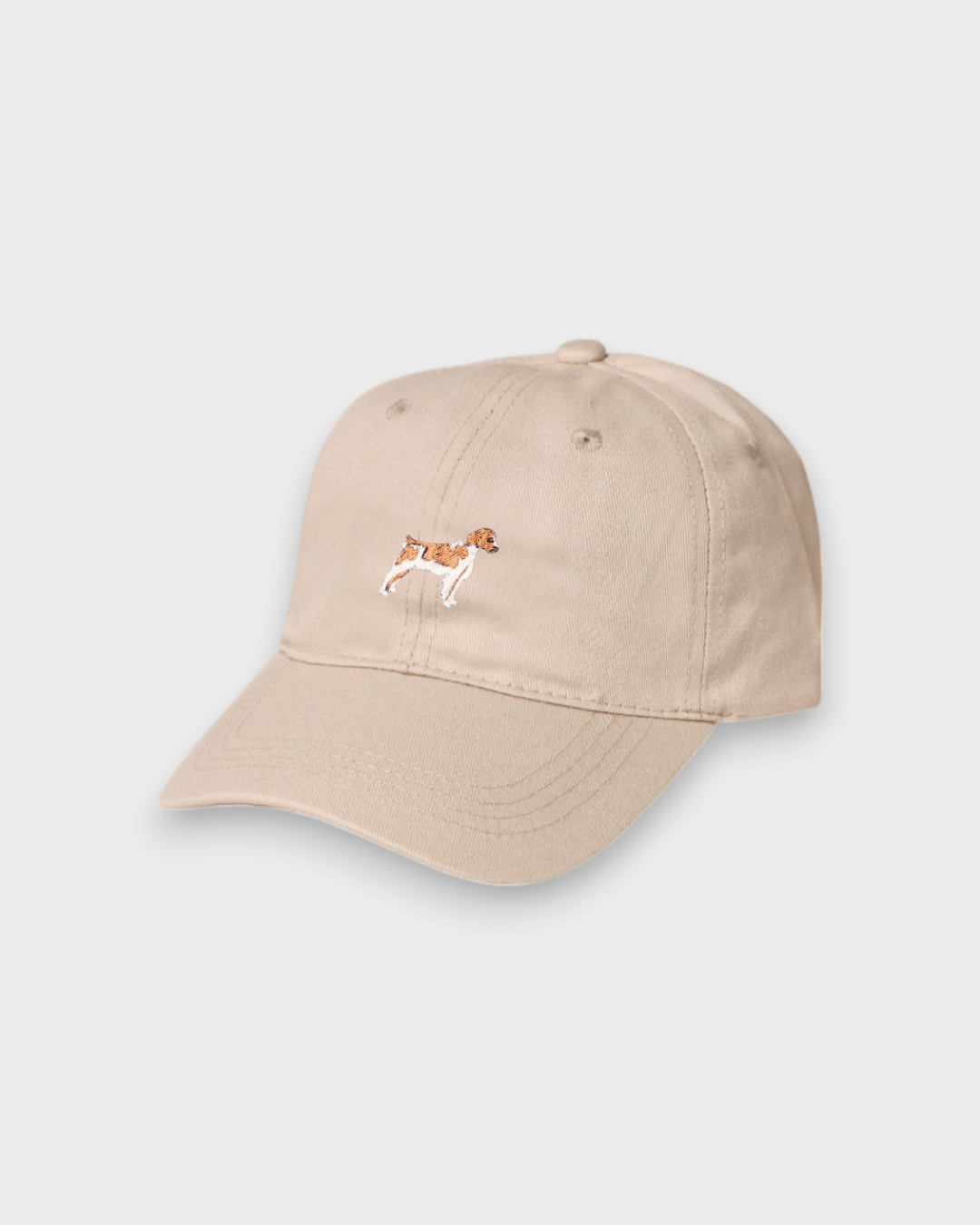 Beige Brittany Spaniel personalised baseball hat with embroidered dog design on front made of 100% washed cotton