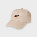 Beige Basset Hound Personalised Hat with embroidered dog design and customizable back embroidery in cotton baseball style