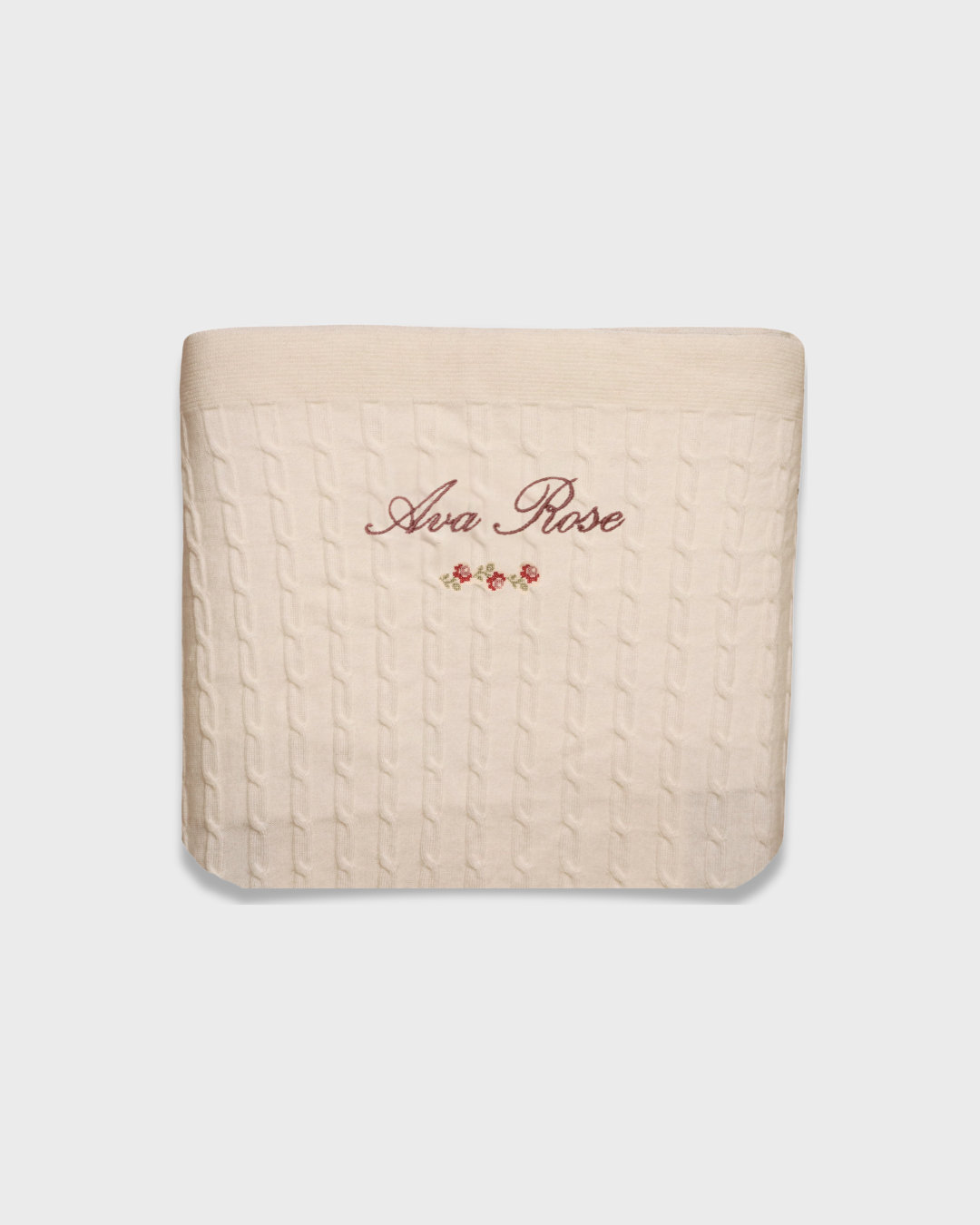 Merino baby blanket with personalized embroidery and vintage rosette design