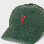 Green baseball cap with red lobster embroidery and personalized text option.