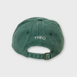 Green Hole In 1 personalised hat with adjustable strap and embroidered name Theo on the back
