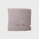 grey merino baby blanket with embroidered vintage bow and personalized name