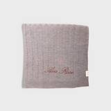 grey merino baby blanket with embroidered vintage bow and personalized name