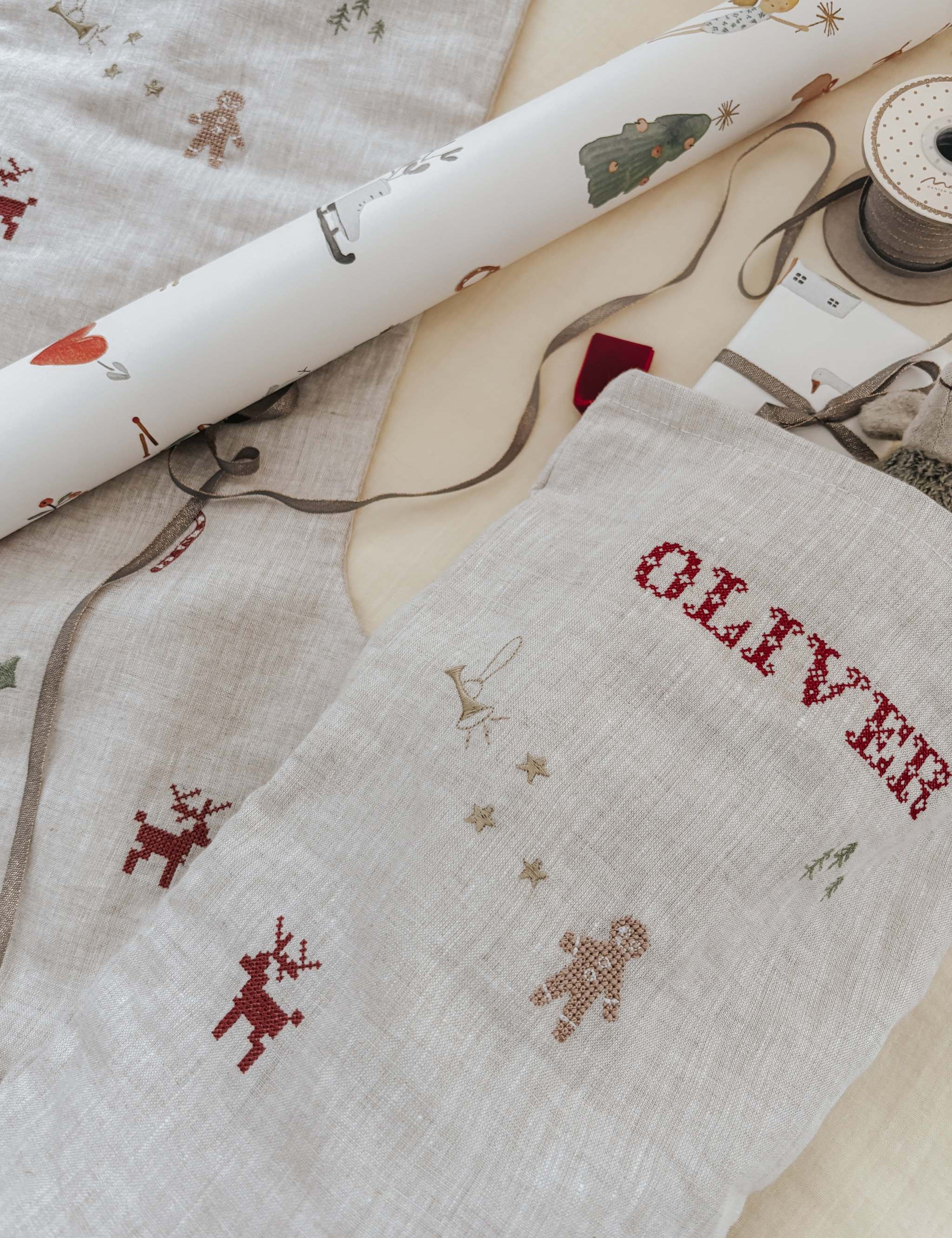 Natural linen stocking with holiday embroidery and personalized name Oliver