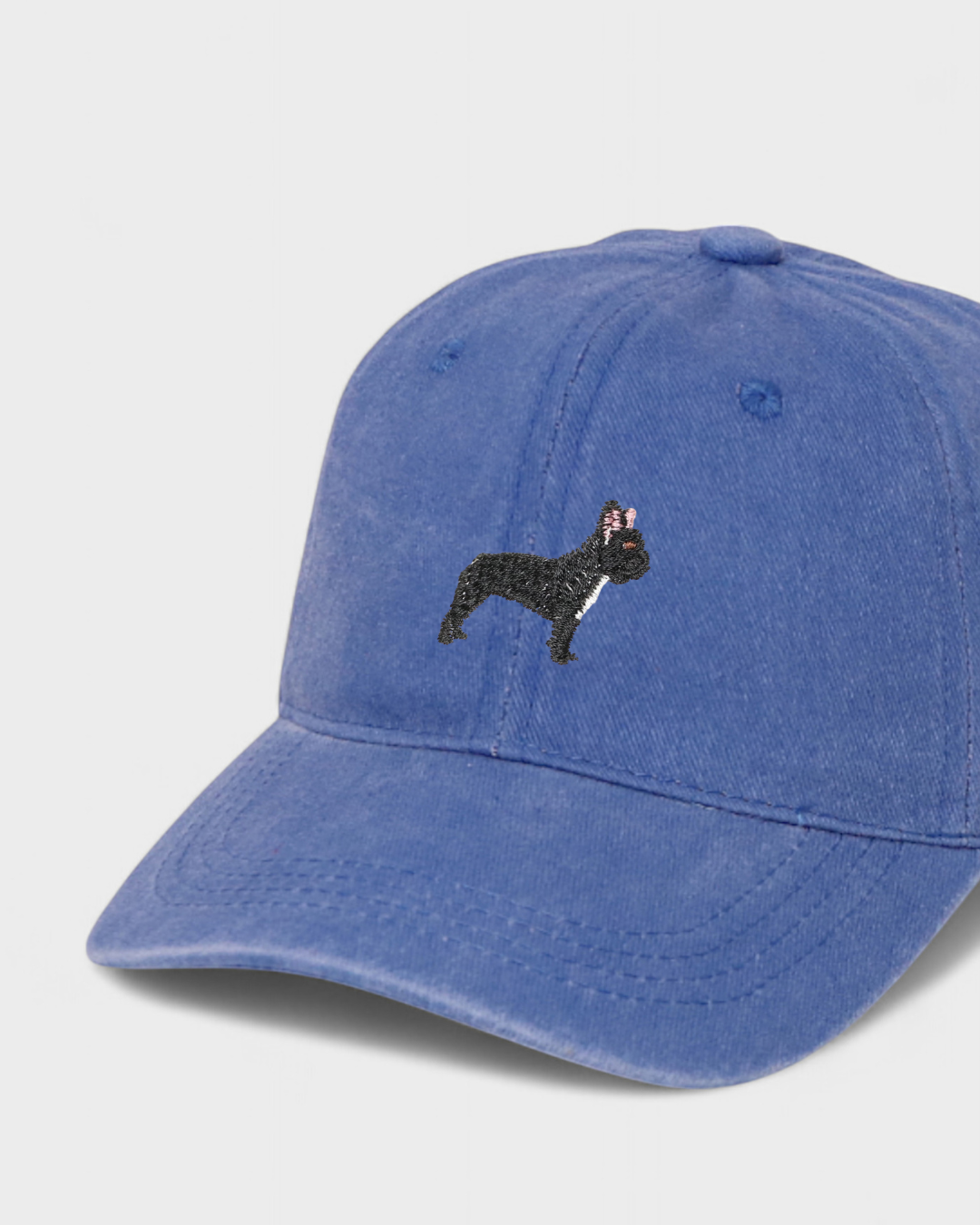 Blue baseball hat with embroidered hand-drawn French Bulldog design, personalized embroidery option, 100% washed cotton.