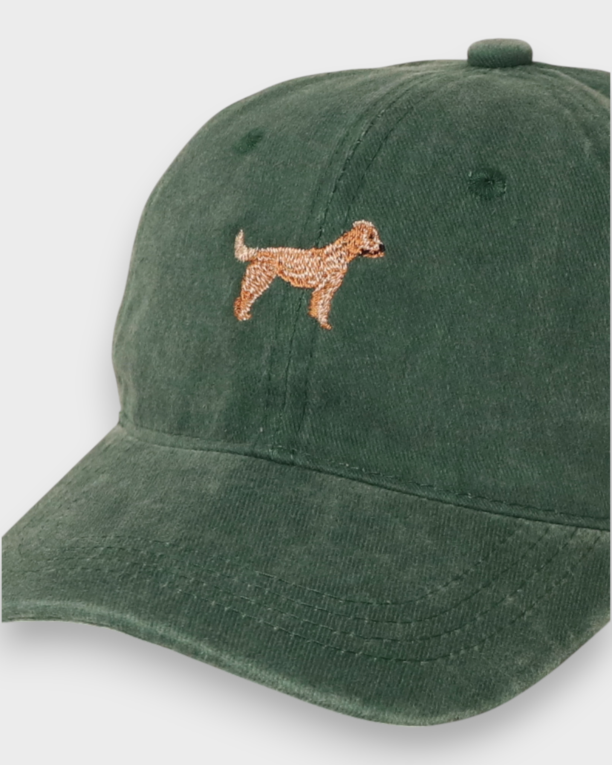 Green baseball cap with embroidered Goldendoodle dog design on the front, personalised hat made of 100% washed cotton.