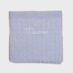 Merino baby blanket with moon and stars design embroidered in soft wool.