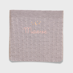 Merino baby blanket with moon and stars embroidery design.