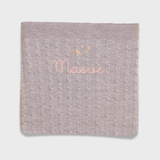 Merino baby blanket with moon and stars embroidery design.
