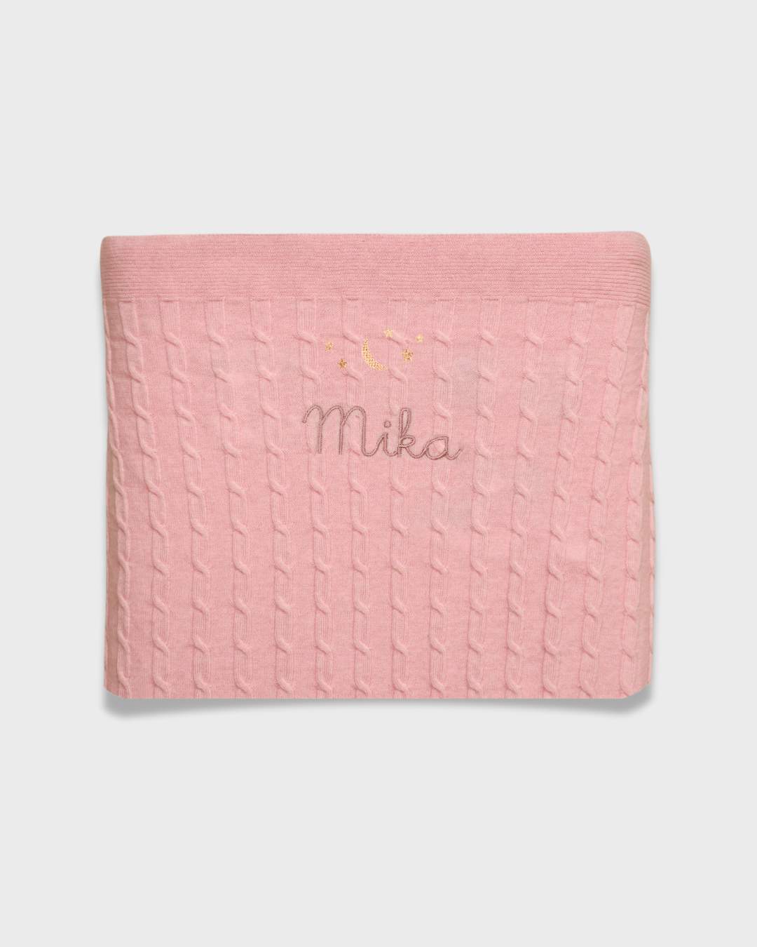 Merino baby blanket with moon and stars design, pink with personalized embroidery.