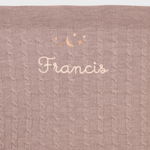 Merino Baby Blanket with moon and stars design and embroidered personalization.