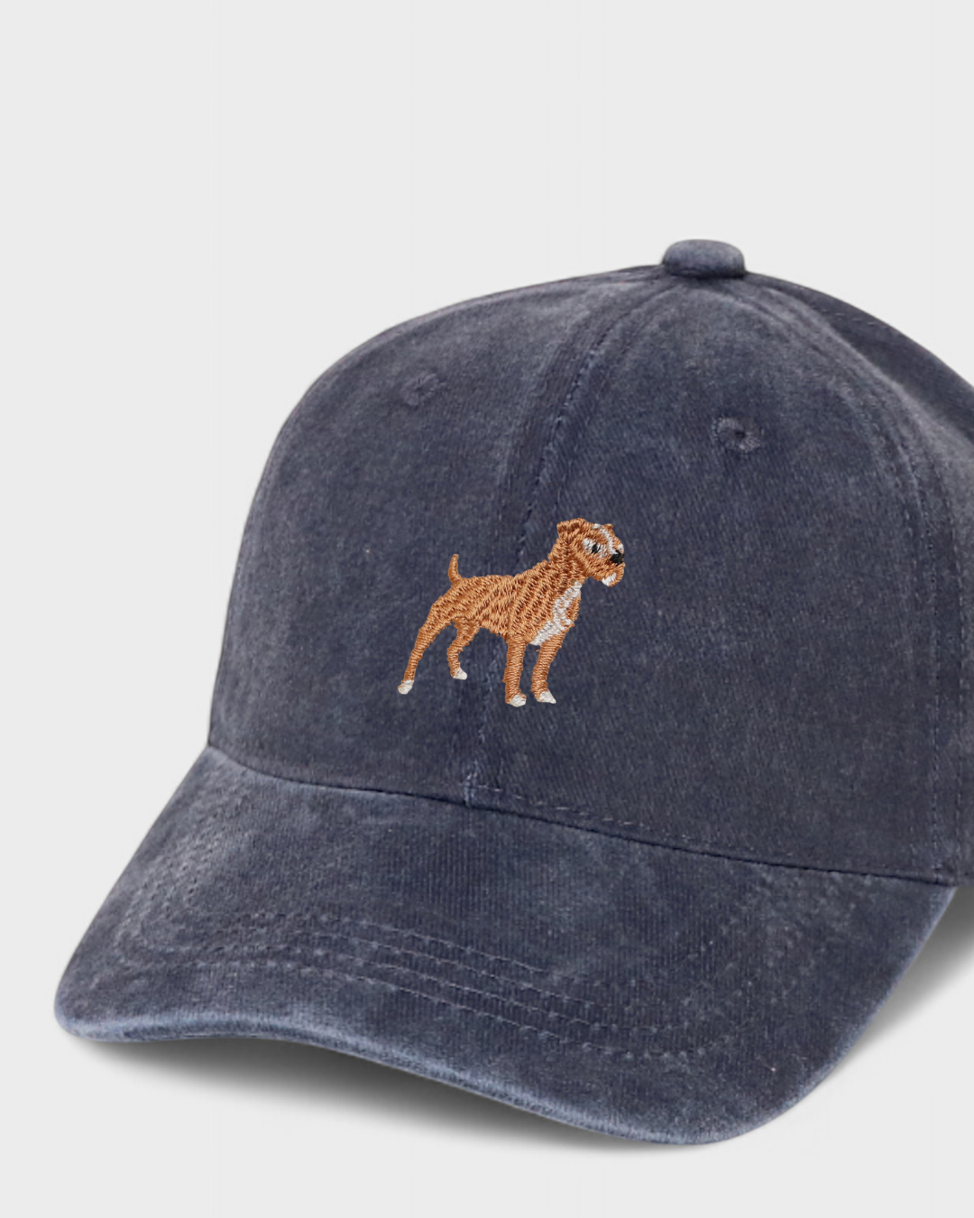 Navy blue baseball hat with embroidered Staffordshire Bull Terrier design and customizable back embroidery