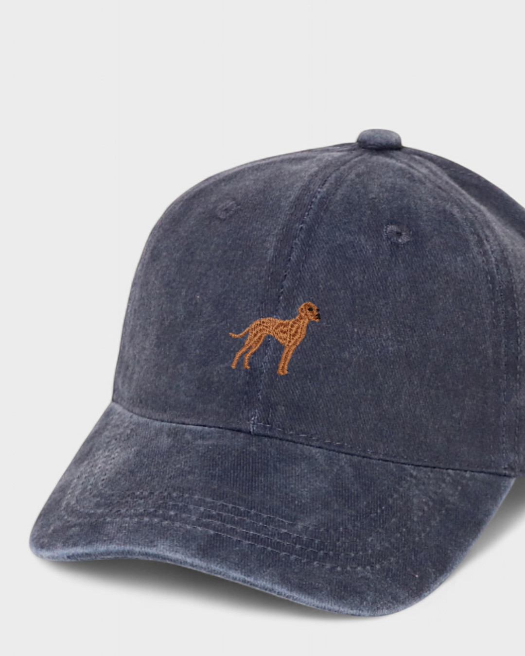 Navy blue washed cotton baseball hat with embroidered hand-drawn Vizsla dog design front, personalized embroidery options on back.