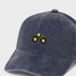Tractor Personalised Hat with hand-drawn tractor embroidery on front, made of 100% washed cotton.