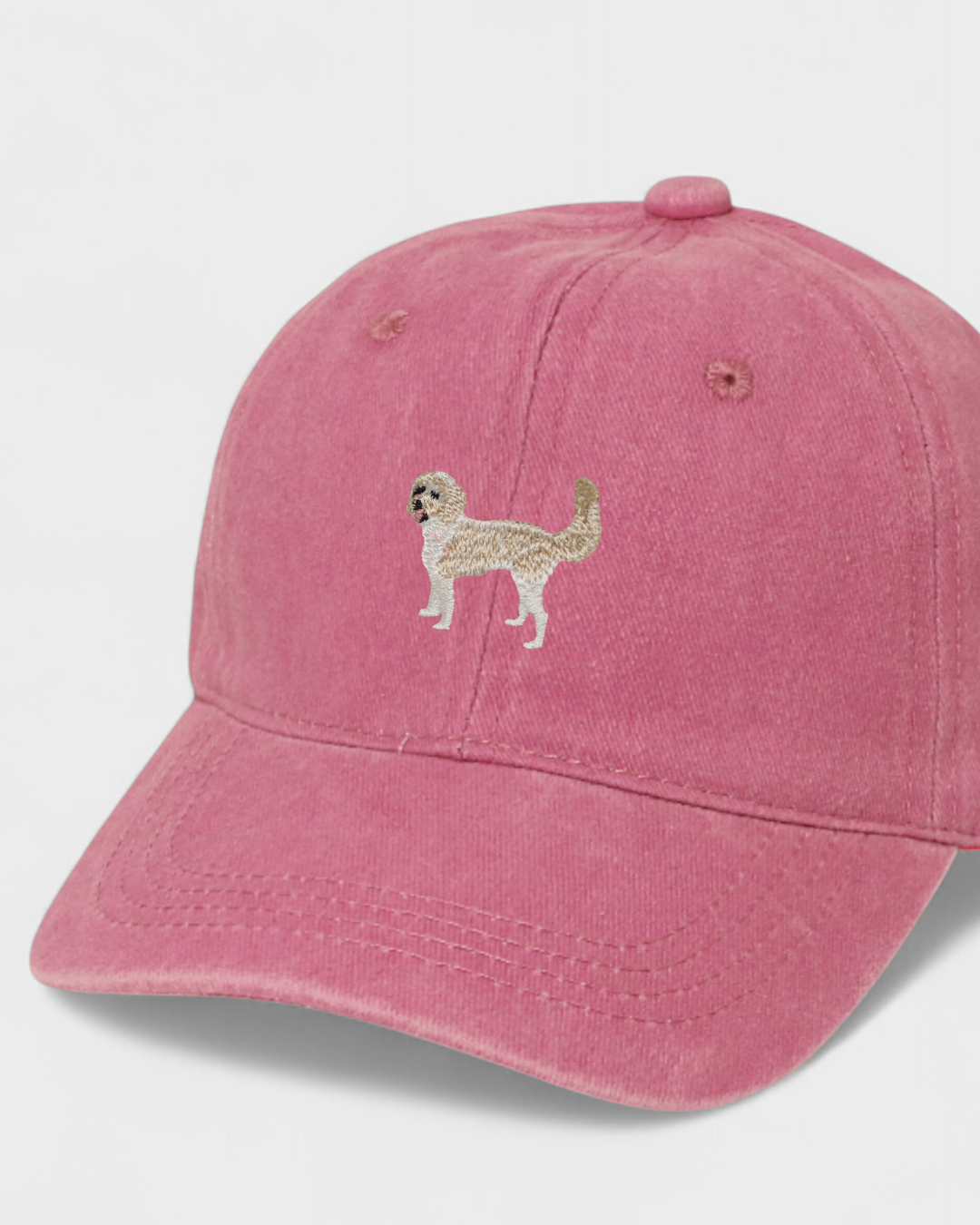 Pink Sheepadoodle Personalised Hat with hand-embroidered dog design on front and custom embroidery option on back, made of 100% washed cotton.