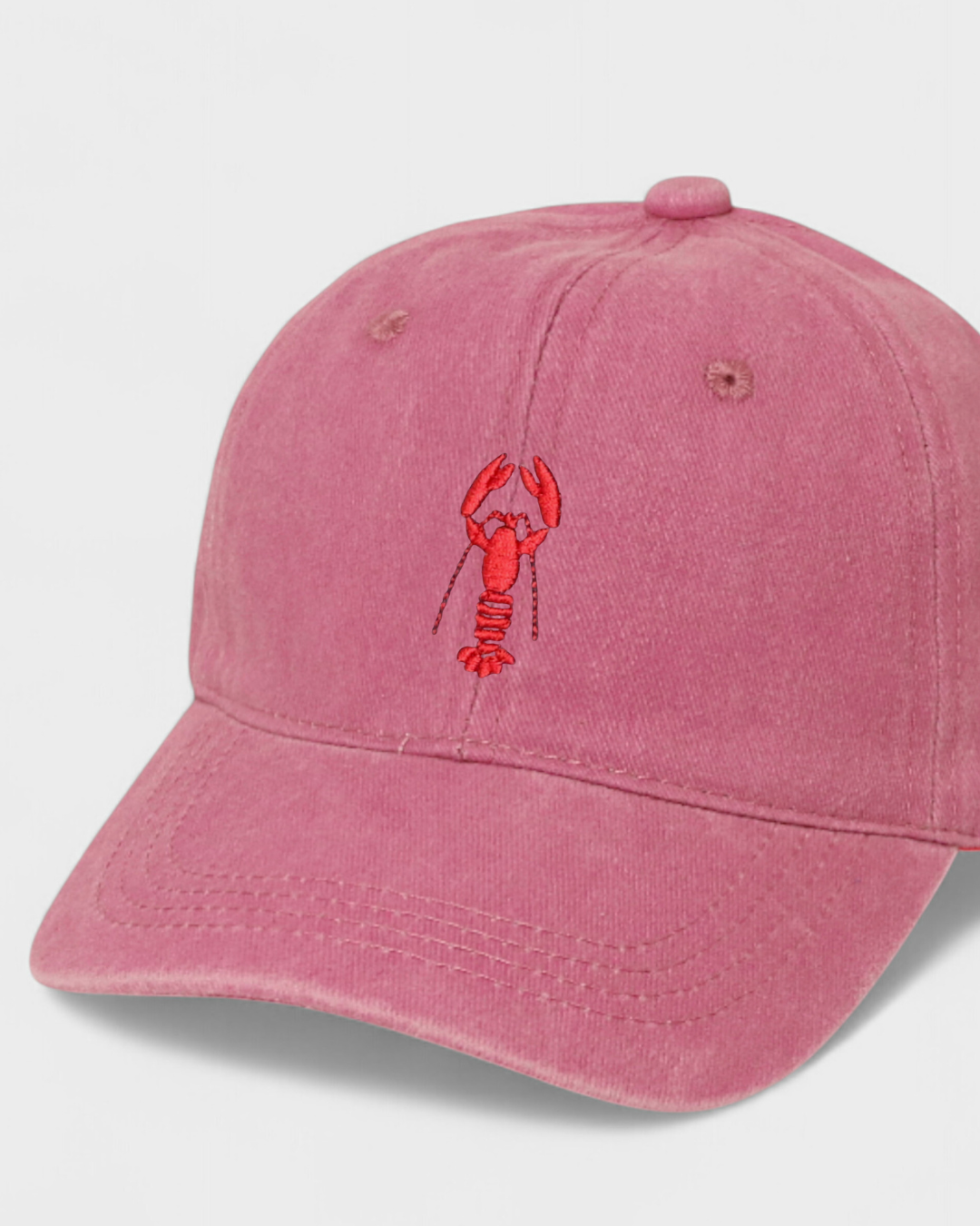 Pink baseball cap with lobster embroidery design, personalized hat.