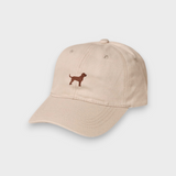 Beige personalised hat with embroidered hand-drawn Labrador design on front, made of 100% washed cotton in classic baseball style
