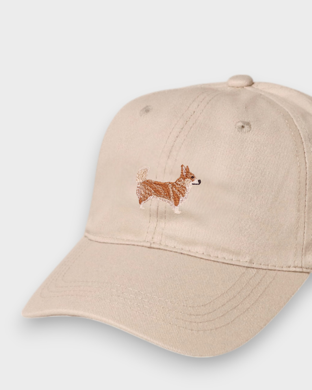 Beige Corgi personalised baseball cap with hand-embroidered dog design on front made from 100% washed cotton