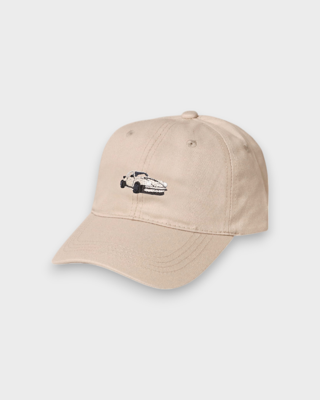 Beige personalised baseball hat with hand-drawn Porsche 930 embroidery front design made of 100% washed cotton
