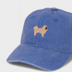 Husky personalised hat with hand-drawn Chow Chow embroidery on blue cotton fabric.