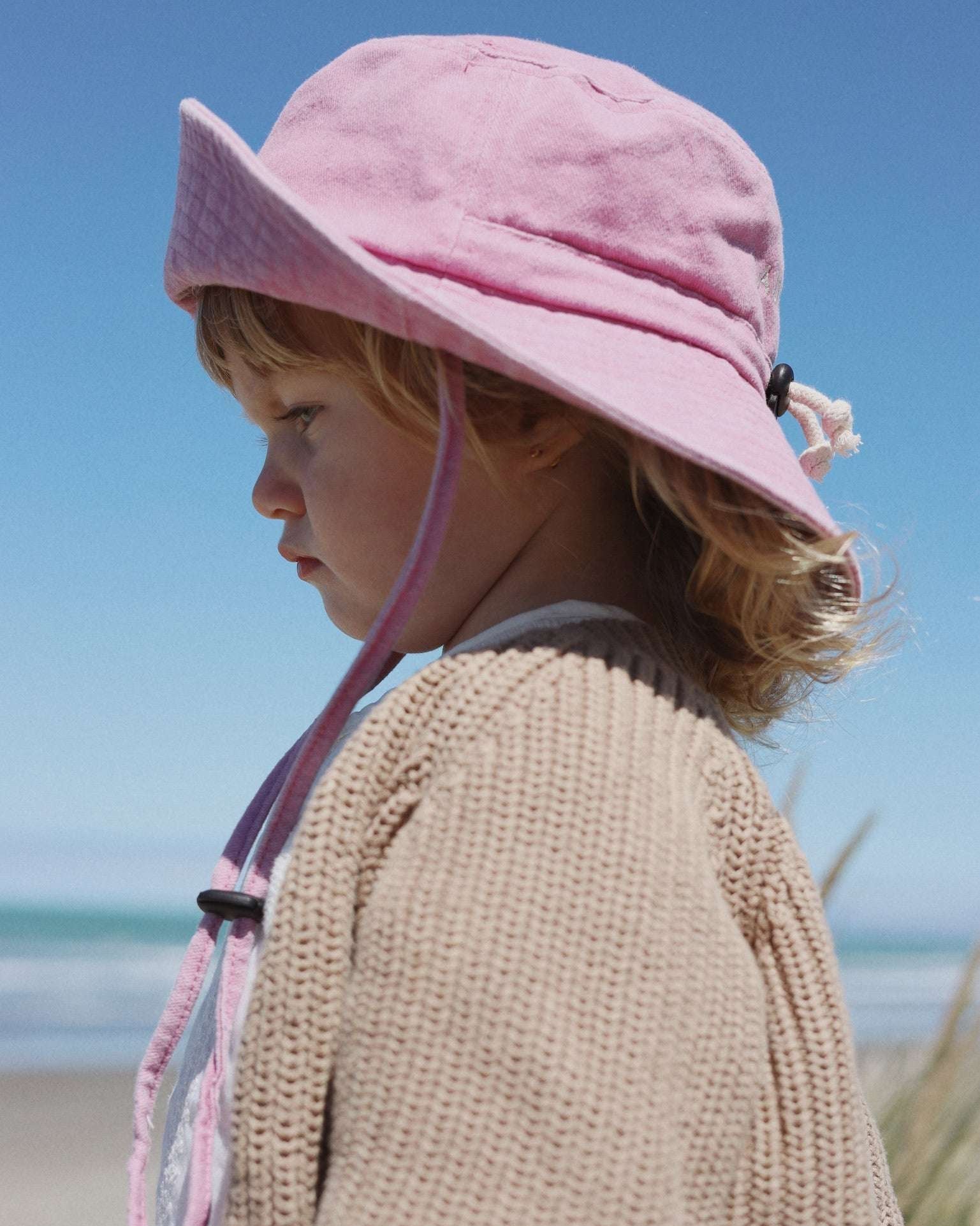 Customised pink bucket hat for kids made of 100% washed cotton.