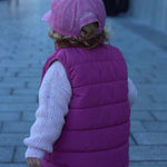 Dalmatian personalised hat worn by child walking on a pathway.